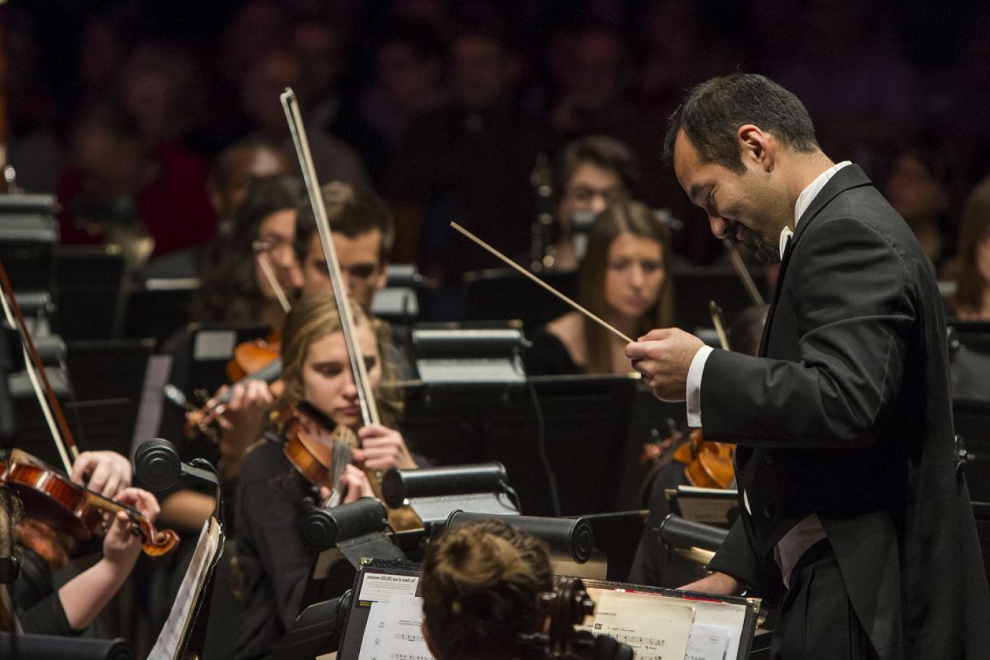 Prof. Edward Kawakami leads the Carthage Philharmonic during a Carthage Christmas Festival.