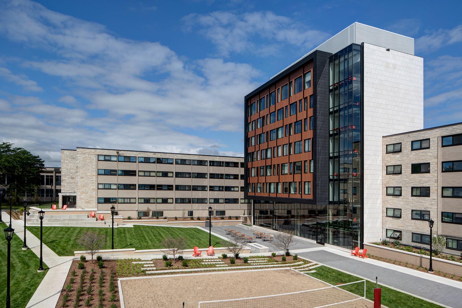 Outside The Tower, students can play on the volleyball courts, study in a red chair, and take in beautiful Lake Michigan views.